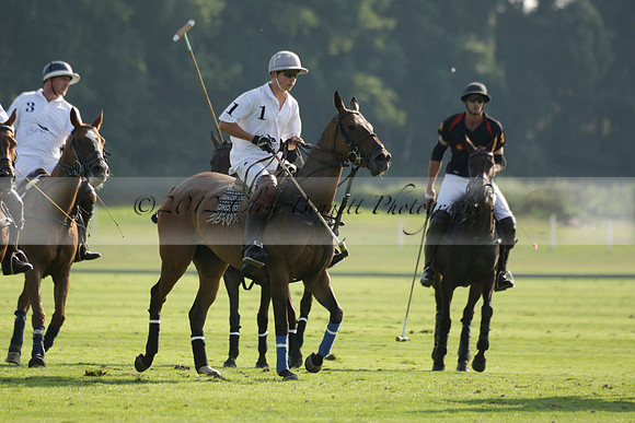 Pluma Negra (white) v Shoreline (black) in the Brecknock Cup Subsidiary final polo match played on Sunday 25 August 2013 at Cowdray Park Polo Club on Ambersham 1. 2013.10.12 www.polopictures.co.uk
