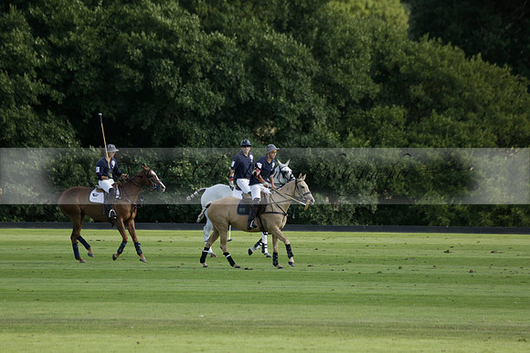 Pandas (white) v Home Farm (navy) in a Park House West Sussex Cup Polo match on Brooksfield at Cowdray Park Polo Club on Friday 30 August 2013. 2013.08.30 www.polopictures.co.uk