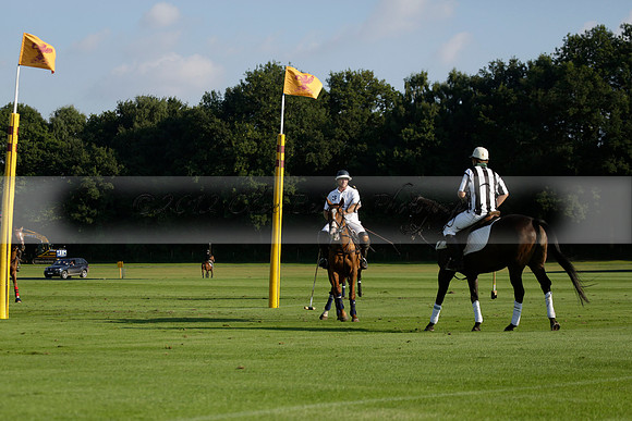 Pluma Negra (white) v Shoreline (black) in the Brecknock Cup Subsidiary final polo match played on Sunday 25 August 2013 at Cowdray Park Polo Club on Ambersham 1. 2013.10.12 www.polopictures.co.uk