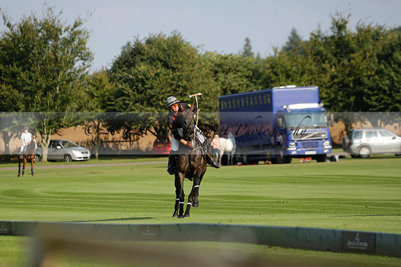 Pluma Negra (white) v Shoreline (black) in the Brecknock Cup Subsidiary final polo match played on Sunday 25 August 2013 at Cowdray Park Polo Club on Ambersham 1. 2013.10.12 www.polopictures.co.uk