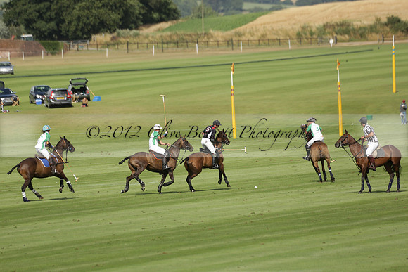 Jaeger Le Coultre (black)  v Wairakei Pastoral (white) in a Jaeger Le Coultre Holden White Cup polo match played on 29 July 2013 at Cowdray Park Polo Club on Brooksfieldwww.polopictures.co.uk