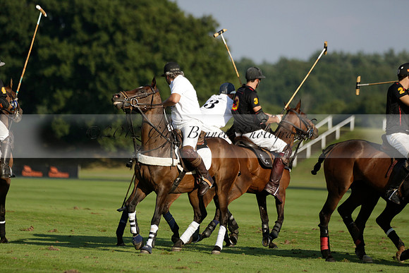 Pluma Negra (white) v Shoreline (black) in the Brecknock Cup Subsidiary final polo match played on Sunday 25 August 2013 at Cowdray Park Polo Club on Ambersham 1. 2013.10.12 www.polopictures.co.uk