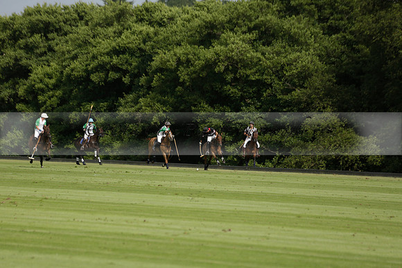 Jaeger Le Coultre (black)  v Wairakei Pastoral (white) in a Jaeger Le Coultre Holden White Cup polo match played on 29 July 2013 at Cowdray Park Polo Club on Brooksfieldwww.polopictures.co.uk
