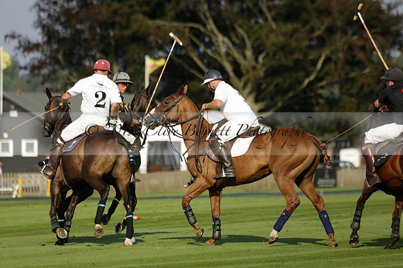 Pluma Negra (white) v Shoreline (black) in the Brecknock Cup Subsidiary final polo match played on Sunday 25 August 2013 at Cowdray Park Polo Club on Ambersham 1. 2013.10.12 www.polopictures.co.uk