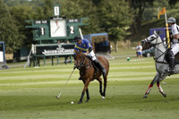 Combe Place (blue) v Silver Fox (white) in a Park House West Sussex Cup Polo match on Ambersham 1 at Cowdray Park Polo Club on Friday 30 August 2013. 2013.08.30 www.polopictures.co.uk