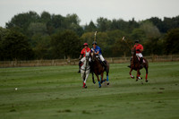 Ghost Chilli (blue) v Team Tonic (red) in a Lodsworth Cup Polo match on Ambersham 3 at Cowdray Park Polo Club on Friday 30 August 2013. 2013.08.30 www.polopictures.co.uk