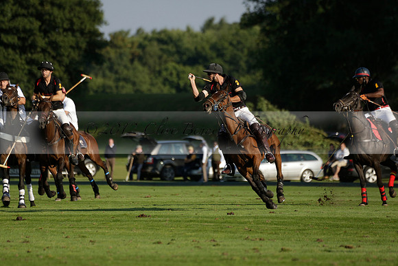 Pluma Negra (white) v Shoreline (black) in the Brecknock Cup Subsidiary final polo match played on Sunday 25 August 2013 at Cowdray Park Polo Club on Ambersham 1. 2013.10.12 www.polopictures.co.uk