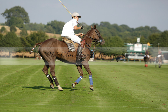 Pluma Negra (white) v Shoreline (black) in the Brecknock Cup Subsidiary final polo match played on Sunday 25 August 2013 at Cowdray Park Polo Club on Ambersham 1. 2013.10.12 www.polopictures.co.uk