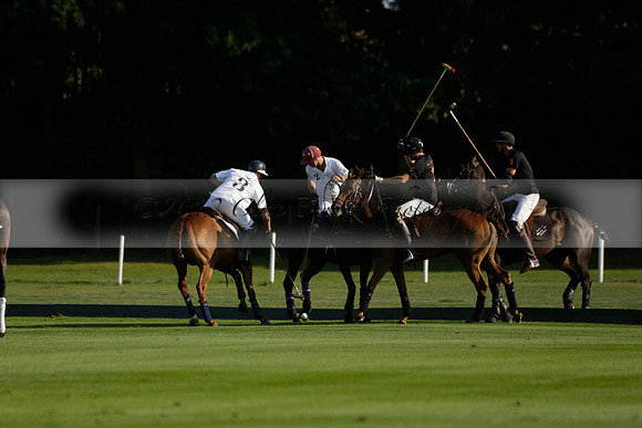 Pluma Negra (white) v Shoreline (black) in the Brecknock Cup Subsidiary final polo match played on Sunday 25 August 2013 at Cowdray Park Polo Club on Ambersham 1. 2013.10.12 www.polopictures.co.uk