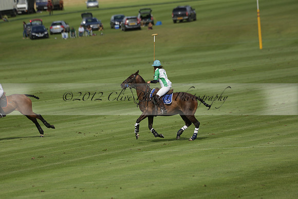 Jaeger Le Coultre (black)  v Wairakei Pastoral (white) in a Jaeger Le Coultre Holden White Cup polo match played on 29 July 2013 at Cowdray Park Polo Club on Brooksfieldwww.polopictures.co.uk