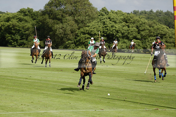 Jaeger Le Coultre (black)  v Wairakei Pastoral (white) in a Jaeger Le Coultre Holden White Cup polo match played on 29 July 2013 at Cowdray Park Polo Club on Brooksfieldwww.polopictures.co.uk