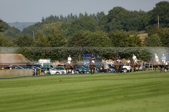 Pluma Negra (white) v Shoreline (black) in the Brecknock Cup Subsidiary final polo match played on Sunday 25 August 2013 at Cowdray Park Polo Club on Ambersham 1. 2013.10.12 www.polopictures.co.uk