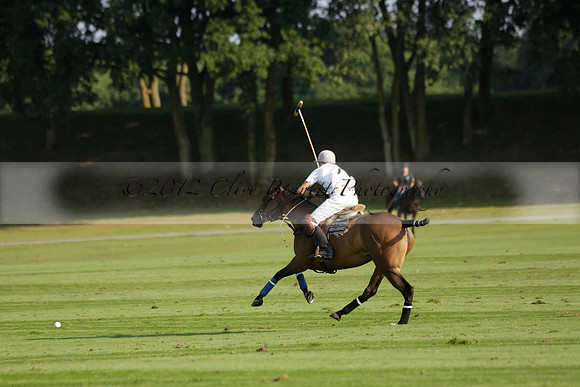 Pluma Negra (white) v Shoreline (black) in the Brecknock Cup Subsidiary final polo match played on Sunday 25 August 2013 at Cowdray Park Polo Club on Ambersham 1. 2013.10.12 www.polopictures.co.uk