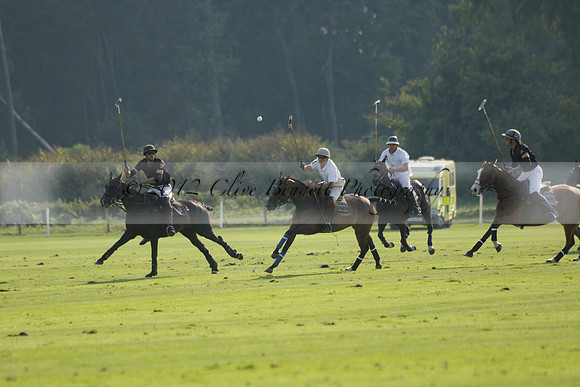 Pluma Negra (white) v Shoreline (black) in the Brecknock Cup Subsidiary final polo match played on Sunday 25 August 2013 at Cowdray Park Polo Club on Ambersham 1. 2013.10.12 www.polopictures.co.uk