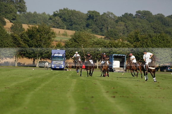 Pluma Negra (white) v Shoreline (black) in the Brecknock Cup Subsidiary final polo match played on Sunday 25 August 2013 at Cowdray Park Polo Club on Ambersham 1. 2013.10.12 www.polopictures.co.uk