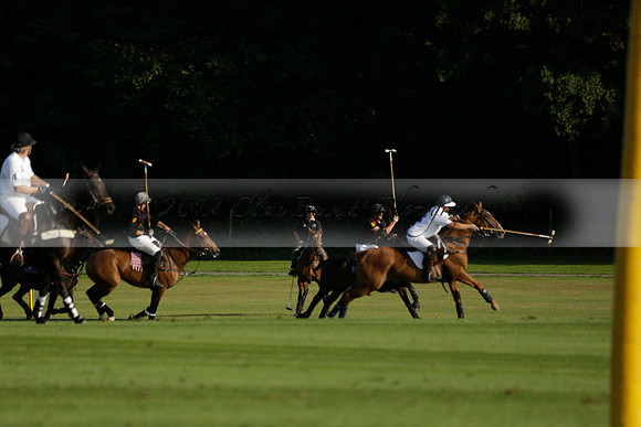 Pluma Negra (white) v Shoreline (black) in the Brecknock Cup Subsidiary final polo match played on Sunday 25 August 2013 at Cowdray Park Polo Club on Ambersham 1. 2013.10.12 www.polopictures.co.uk