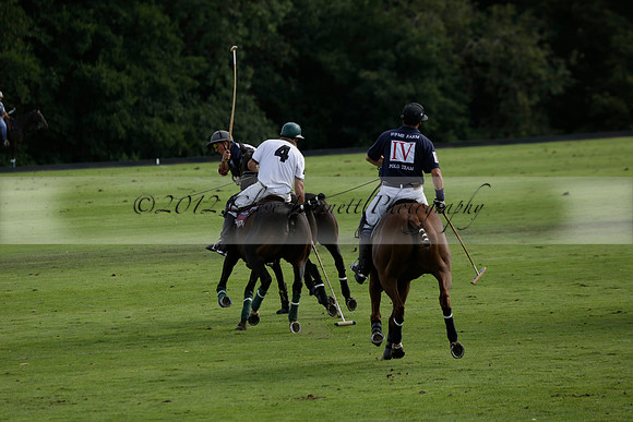 Pandas (white) v Home Farm (navy) in a Park House West Sussex Cup Polo match on Brooksfield at Cowdray Park Polo Club on Friday 30 August 2013. 2013.08.30 www.polopictures.co.uk