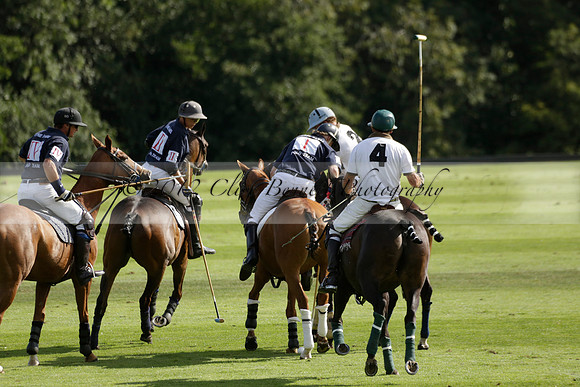 Pandas (white) v Home Farm (navy) in a Park House West Sussex Cup Polo match on Brooksfield at Cowdray Park Polo Club on Friday 30 August 2013. 2013.08.30 www.polopictures.co.uk