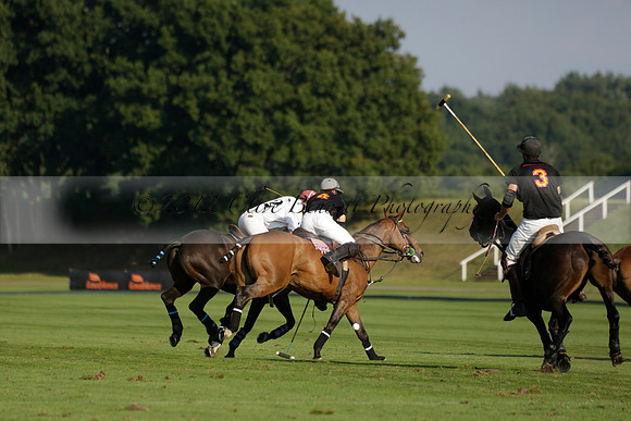 Pluma Negra (white) v Shoreline (black) in the Brecknock Cup Subsidiary final polo match played on Sunday 25 August 2013 at Cowdray Park Polo Club on Ambersham 1. 2013.10.12 www.polopictures.co.uk