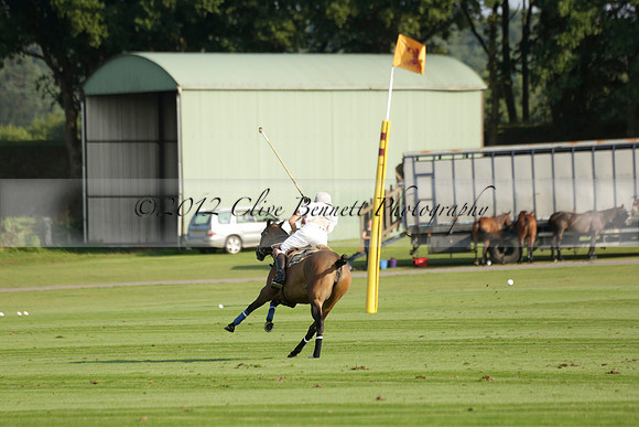 Pluma Negra (white) v Shoreline (black) in the Brecknock Cup Subsidiary final polo match played on Sunday 25 August 2013 at Cowdray Park Polo Club on Ambersham 1. 2013.10.12 www.polopictures.co.uk
