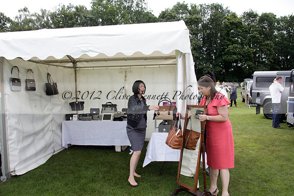 Sumaya v Cortium in a Veuve Clicquot Gold Cup semi-final polo match played on Thursday 12 July 2012 at Cowdray Park Polo Club on Ambersham 1
