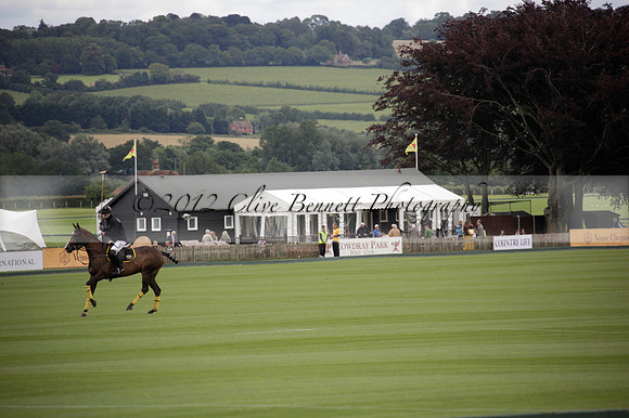 Sumaya v Cortium in a Veuve Clicquot Gold Cup semi-final polo match played on Thursday 12 July 2012 at Cowdray Park Polo Club on Ambersham 1