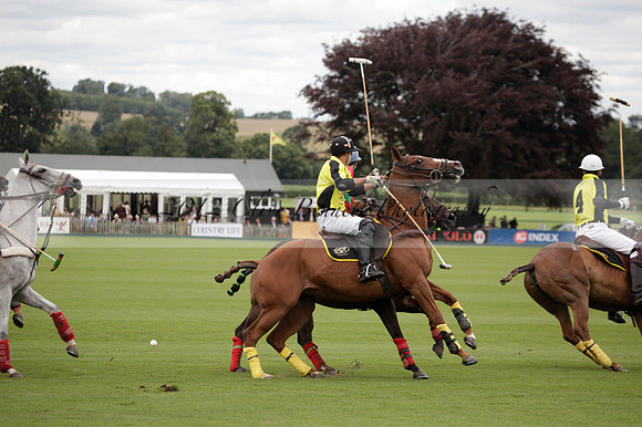 Sumaya v Cortium in a Veuve Clicquot Gold Cup semi-final polo match played on Thursday 12 July 2012 at Cowdray Park Polo Club on Ambersham 1