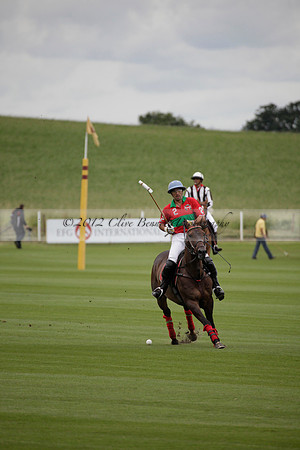Sumaya v Cortium in a Veuve Clicquot Gold Cup semi-final polo match played on Thursday 12 July 2012 at Cowdray Park Polo Club on Ambersham 1