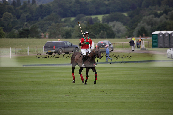 Sumaya v Cortium in a Veuve Clicquot Gold Cup semi-final polo match played on Thursday 12 July 2012 at Cowdray Park Polo Club on Ambersham 1
