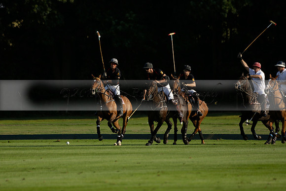 Pluma Negra (white) v Shoreline (black) in the Brecknock Cup Subsidiary final polo match played on Sunday 25 August 2013 at Cowdray Park Polo Club on Ambersham 1. 2013.10.12 www.polopictures.co.uk