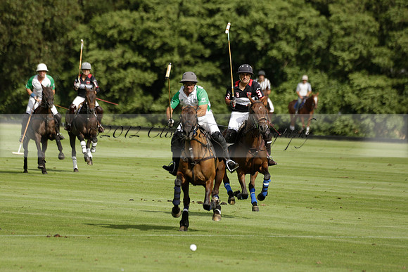 Jaeger Le Coultre (black)  v Wairakei Pastoral (white) in a Jaeger Le Coultre Holden White Cup polo match played on 29 July 2013 at Cowdray Park Polo Club on Brooksfieldwww.polopictures.co.uk