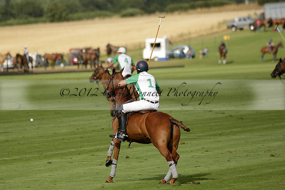 Jaeger Le Coultre (black)  v Wairakei Pastoral (white) in a Jaeger Le Coultre Holden White Cup polo match played on 29 July 2013 at Cowdray Park Polo Club on Brooksfieldwww.polopictures.co.uk