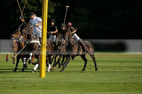 Pluma Negra (white) v Shoreline (black) in the Brecknock Cup Subsidiary final polo match played on Sunday 25 August 2013 at Cowdray Park Polo Club on Ambersham 1. 2013.10.12 www.polopictures.co.uk