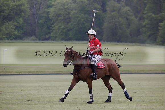 Hollycombe v Emlor in a Dollar Cup polo match at played at Cowdray Park Polo Club on Lawns 2 on 19 May 2012