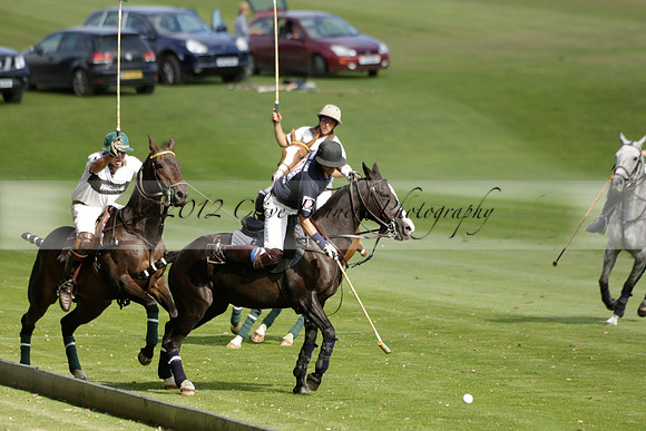 Pandas (white) v Home Farm (navy) in a Park House West Sussex Cup Polo match on Brooksfield at Cowdray Park Polo Club on Friday 30 August 2013. 2013.08.30 www.polopictures.co.uk