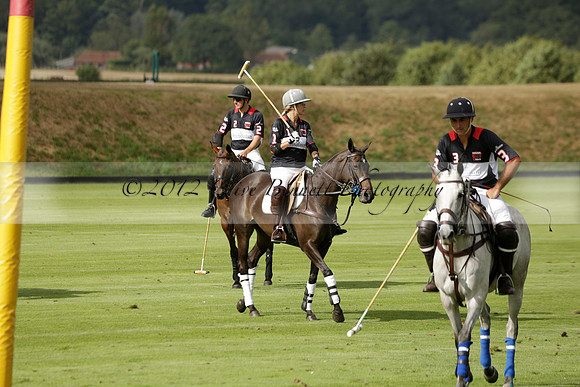 Jaeger Le Coultre (black)  v Wairakei Pastoral (white) in a Jaeger Le Coultre Holden White Cup polo match played on 29 July 2013 at Cowdray Park Polo Club on Brooksfieldwww.polopictures.co.uk