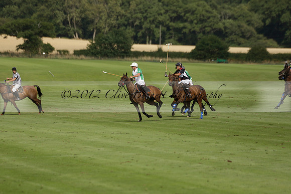 Jaeger Le Coultre (black)  v Wairakei Pastoral (white) in a Jaeger Le Coultre Holden White Cup polo match played on 29 July 2013 at Cowdray Park Polo Club on Brooksfieldwww.polopictures.co.uk