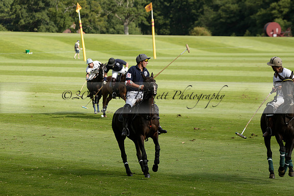 Pandas (white) v Home Farm (navy) in a Park House West Sussex Cup Polo match on Brooksfield at Cowdray Park Polo Club on Friday 30 August 2013. 2013.08.30 www.polopictures.co.uk