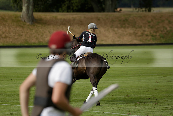Jaeger Le Coultre (black)  v Wairakei Pastoral (white) in a Jaeger Le Coultre Holden White Cup polo match played on 29 July 2013 at Cowdray Park Polo Club on Brooksfieldwww.polopictures.co.uk