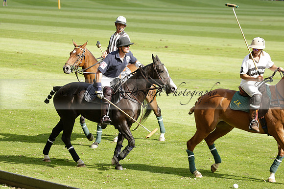 Pandas (white) v Home Farm (navy) in a Park House West Sussex Cup Polo match on Brooksfield at Cowdray Park Polo Club on Friday 30 August 2013. 2013.08.30 www.polopictures.co.uk