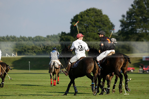 Pluma Negra (white) v Shoreline (black) in the Brecknock Cup Subsidiary final polo match played on Sunday 25 August 2013 at Cowdray Park Polo Club on Ambersham 1. 2013.10.12 www.polopictures.co.uk