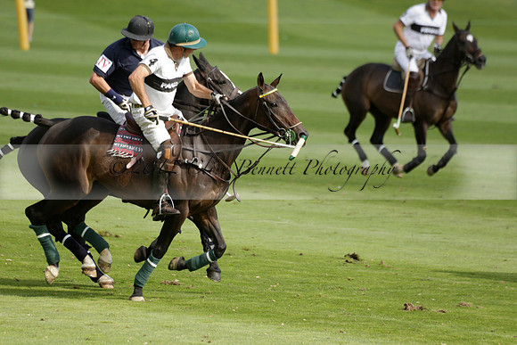 Pandas (white) v Home Farm (navy) in a Park House West Sussex Cup Polo match on Brooksfield at Cowdray Park Polo Club on Friday 30 August 2013. 2013.08.30 www.polopictures.co.uk