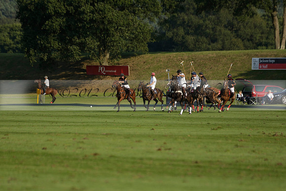 Pluma Negra (white) v Shoreline (black) in the Brecknock Cup Subsidiary final polo match played on Sunday 25 August 2013 at Cowdray Park Polo Club on Ambersham 1. 2013.10.12 www.polopictures.co.uk