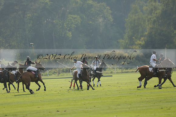Pluma Negra (white) v Shoreline (black) in the Brecknock Cup Subsidiary final polo match played on Sunday 25 August 2013 at Cowdray Park Polo Club on Ambersham 1. 2013.10.12 www.polopictures.co.uk
