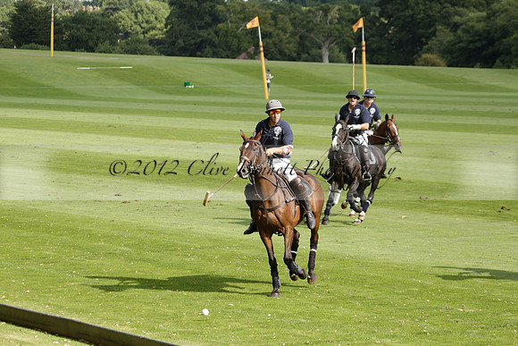 Pandas (white) v Home Farm (navy) in a Park House West Sussex Cup Polo match on Brooksfield at Cowdray Park Polo Club on Friday 30 August 2013. 2013.08.30 www.polopictures.co.uk