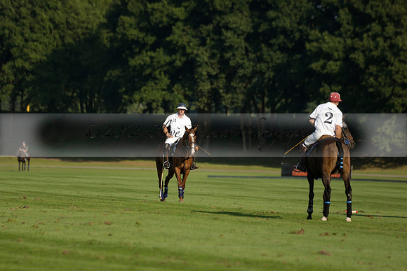 Pluma Negra (white) v Shoreline (black) in the Brecknock Cup Subsidiary final polo match played on Sunday 25 August 2013 at Cowdray Park Polo Club on Ambersham 1. 2013.10.12 www.polopictures.co.uk