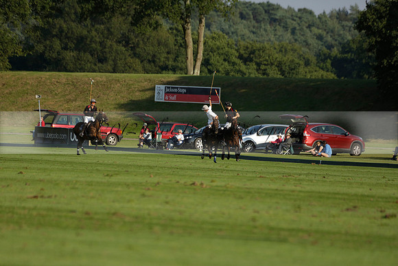 Pluma Negra (white) v Shoreline (black) in the Brecknock Cup Subsidiary final polo match played on Sunday 25 August 2013 at Cowdray Park Polo Club on Ambersham 1. 2013.10.12 www.polopictures.co.uk