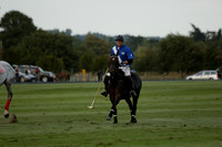 Ghost Chilli (blue) v Team Tonic (red) in a Lodsworth Cup Polo match on Ambersham 3 at Cowdray Park Polo Club on Friday 30 August 2013. 2013.08.30 www.polopictures.co.uk