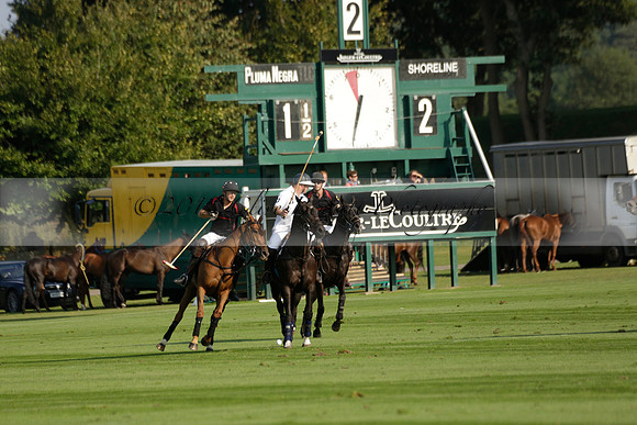 Pluma Negra (white) v Shoreline (black) in the Brecknock Cup Subsidiary final polo match played on Sunday 25 August 2013 at Cowdray Park Polo Club on Ambersham 1. 2013.10.12 www.polopictures.co.uk