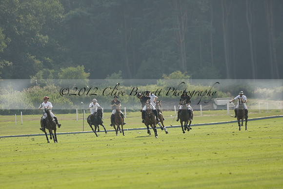 Pluma Negra (white) v Shoreline (black) in the Brecknock Cup Subsidiary final polo match played on Sunday 25 August 2013 at Cowdray Park Polo Club on Ambersham 1. 2013.10.12 www.polopictures.co.uk
